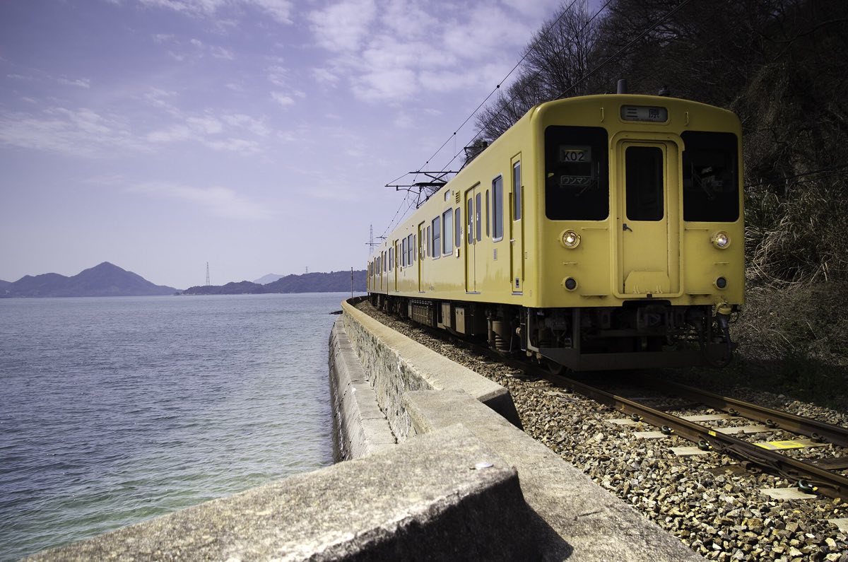 A train beside the Seto Inland Sea